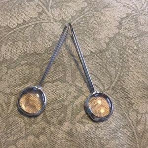 Silver earrings with very light pink glass bauble.